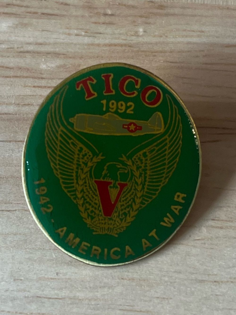 TICO 1992 Green Enamel Military Pin with Red Accents
